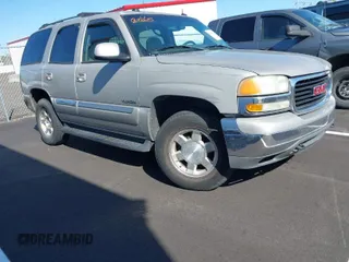 2004 GMC Yukon SLT with VIN 1GKEK13Z14J173689, listed as a IAAI auction lot 41979936 with 1 mi miles. Bid and sale history available at carsss.com. Image 1.