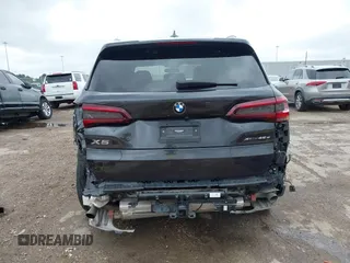 2021 BMW X5 xDrive45e with VIN 5UXTA6C02M9F88978, listed as a IAAI auction lot 42201563 with 23,339 mi miles and . Bid and sale history available at DreamBid. Image 17.
