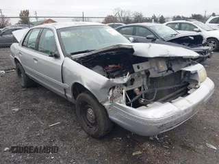 2003 Ford Crown Victoria LX z VIN 2FAFP74W53X151974, wystawiony jako IAAI lot #40887020 z przebiegiem 186 149 mil mil oraz . Historia ofert i sprzedaży dostępna na DreamBid. Obrazek 1.