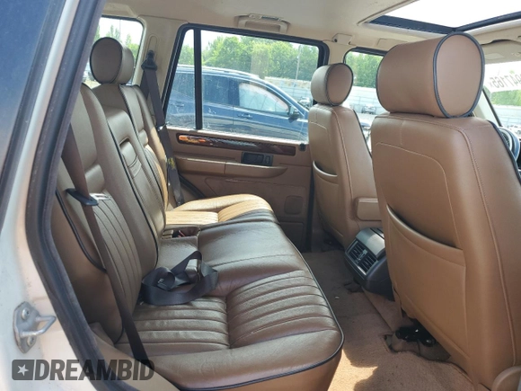 1998 Land Rover Range Rover z VIN SALPV1243WA383806, wystawiony jako Copart lot #58947165 z przebiegiem 156 937 mil mil oraz Czysty tytuł • Clean title. Historia ofert i sprzedaży dostępna na DreamBid. Obrazek 11.