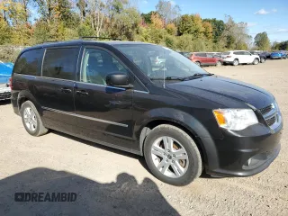 2017 Dodge Grand Caravan Crew Plus with VIN 2C4RDGDGXHR783745, listed as a Copart auction lot 74687684 with 131,657 mi miles and Clean Title. Bid and sale history available at DreamBid. Image 4.