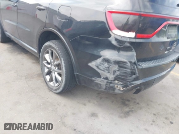 2015 Dodge Durango SXT with VIN 1C4RDJAGXFC796034, listed as a IAAI auction lot 42057983 with 159,108 mi miles and . Bid and sale history available at DreamBid. Image 6.