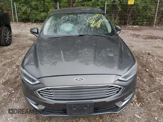 2017 Ford Fusion SE with VIN 3FA6P0HD3HR335350, listed as a IAAI auction lot 42201095 with 165,101 mi miles and . Bid and sale history available at DreamBid. Image 6.