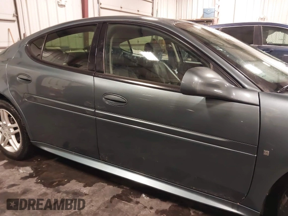 2006 Pontiac Grand Prix GT z VIN 2G2WR554461315118, wystawiony jako IAAI lot #41583027 z przebiegiem 243 614 mil mil oraz . Historia ofert i sprzedaży dostępna na DreamBid. Obrazek 13.