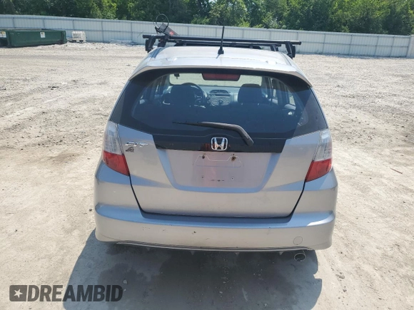 2009 Honda Fit Sport with VIN JHMGE88449S012139, listed as a Copart auction lot 60046185 with 255,292 mi miles and Clean title. Bid and sale history available at DreamBid. Image 6.