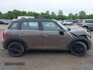2014 MINI Countryman S with VIN WMWZC5C55EWP41717, listed as a IAAI auction lot 42324347 with Not provided miles and . Bid and sale history available at DreamBid. Image 14.