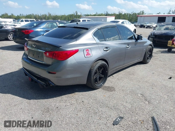 2014 Infiniti Q50 Sport with VIN JN1BV7AP4EM670443, listed as a IAAI auction lot 41801219 with 98,719 mi miles and . Bid and sale history available at DreamBid. Image 4.