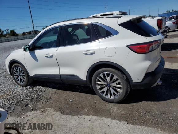 2021 Ford Escape Titanium Hybrid z VIN 1FMCU0DZ5MUB04522, wystawiony jako Copart lot #49127385 z przebiegiem 66 996 mil mil oraz Szkody całkowita. Historia ofert i sprzedaży dostępna na DreamBid. Obrazek 2.
