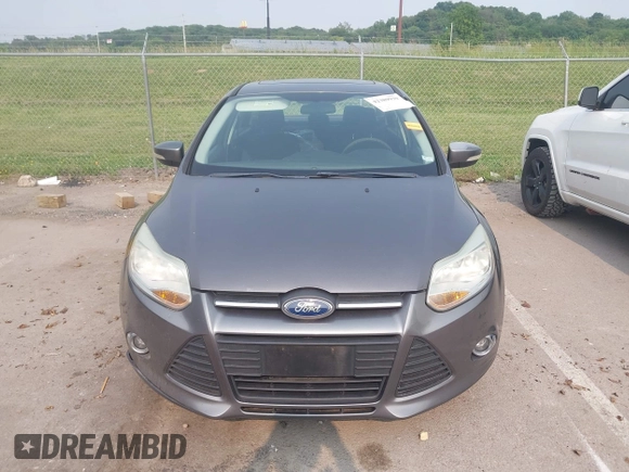 2012 Ford Focus SE z VIN 1FAHP3F24CL227225, wystawiony jako IAAI lot #42389939 z przebiegiem 135 197 mil mil oraz . Historia ofert i sprzedaży dostępna na DreamBid. Obrazek 12.