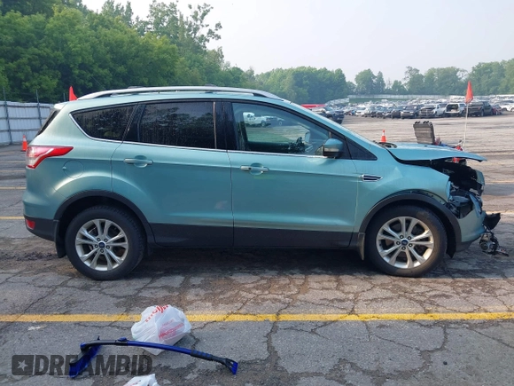 2013 Ford Escape Titanium with VIN 1FMCU9J99DUD63037, listed as a IAAI auction lot 42436605 with 168,200 mi miles and . Bid and sale history available at DreamBid. Image 13.