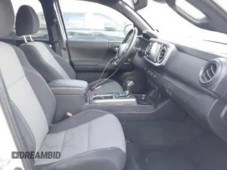 2020 Toyota Tacoma SR5 with VIN 3TMBZ5DN7LM026596, listed as a IAAI auction lot 40705410 with 123,489 mi miles and . Bid and sale history available at DreamBid. Image 5.