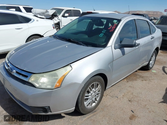 2009 Ford Focus SE z VIN 1FAHP35N99W173410, wystawiony jako IAAI lot #41648274 z przebiegiem 168 767 mil mil oraz . Historia ofert i sprzedaży dostępna na DreamBid. Obrazek 2.