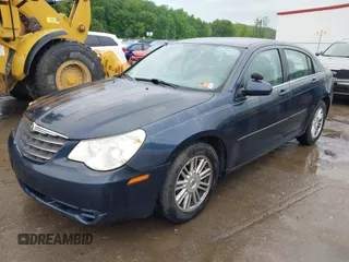 2007 Chrysler Sebring Touring z VIN 1C3LC56K37N644894, wystawiony jako IAAI lot #42326982 z przebiegiem 206 073 mil mil oraz . Historia ofert i sprzedaży dostępna na DreamBid. Obrazek 2.