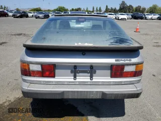 1986 Porsche 944 z VIN WP0AA0946GN459926, wystawiony jako Copart lot #52357845 z przebiegiem 89 937 mil mil oraz Szkoda całkowita • Salvage title. Historia ofert i sprzedaży dostępna na DreamBid. Obrazek 6.