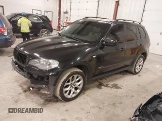 2012 BMW X5 35i with VIN 5UXZV4C55CL990510, listed as a IAAI auction lot 41849293 with 117,522 mi miles and . Bid and sale history available at DreamBid. Image 2.