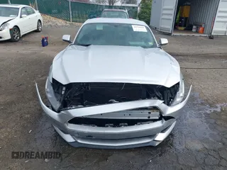 2015 Ford Mustang V6 with VIN 1FA6P8AM3F5348012, listed as a IAAI auction lot 41910661 with 144,584 mi miles and . Bid and sale history available at DreamBid. Image 12.