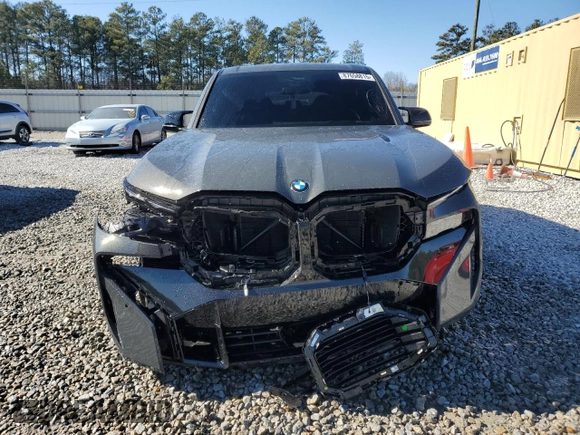 2023 BMW XM z VIN 5YM23CS03P9S57455, wystawiony jako Copart lot #87658815 z przebiegiem Nie podano mil oraz Szkoda całkowita • Salvage title. Historia ofert i sprzedaży dostępna na DreamBid. Obrazek 5.