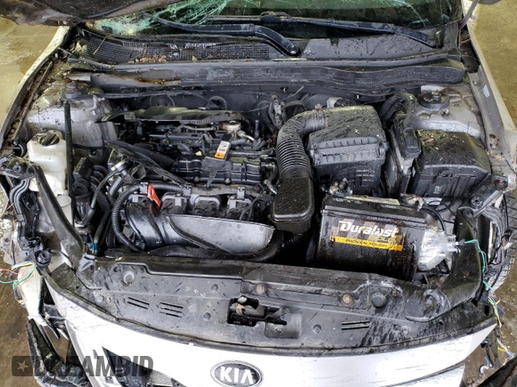 2013 Kia Optima EX с VIN 5XXGN4A70DG239393, выставлен на аукционе Copart как лот 41923615 с пробегом Не указан миль и Списание • Salvage title. История ставок и продаж доступна на DreamBid. Изображение 11.