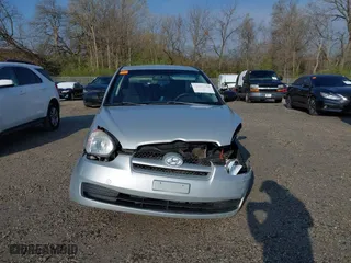 2010 Hyundai Accent GS with VIN KMHCM3AC2AU164786, listed as a IAAI auction lot 41995191 with 148,174 mi miles. Bid and sale history available at carsss.com. Image 12.