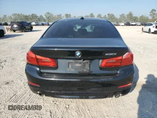 2018 BMW 5 Series 530i with VIN WBAJA5C54JG899845, listed as a Copart auction lot 76386124 with 57,379 mi miles and Salvage Title. Bid and sale history available at DreamBid. Image 6.