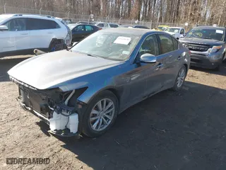 2015 Infiniti Q50 Premium with VIN JN1BV7AP4FM334762, listed as a IAAI auction lot 41443049 with 99,519 mi miles. Bid and sale history available at carsss.com. Image 2.