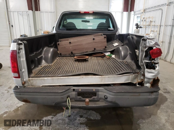 2003 Ford F-150 XL with VIN 1FTRF18273NB92414, listed as a Copart auction lot 71539794 with Not provided miles and Salvage title. Bid and sale history available at DreamBid. Image 6.