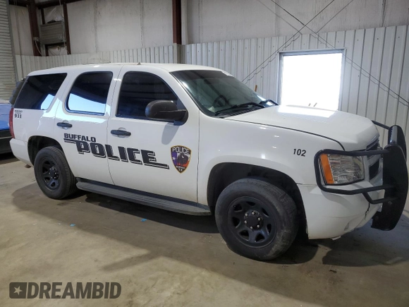 2014 Chevrolet Tahoe Commercial z VIN 1GNLC2E07ER194822, wystawiony jako Copart lot #47253625 z przebiegiem 126 882 mil mil oraz Szkoda całkowita • Salvage title. Historia ofert i sprzedaży dostępna na DreamBid. Obrazek 4.
