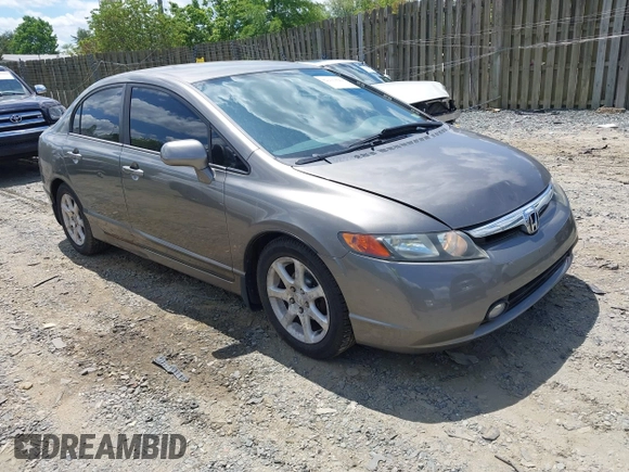 2006 Honda Civic LX with VIN 1HGFA16586L104230, listed as a IAAI auction lot 42215822 with 128,704 mi miles and . Bid and sale history available at DreamBid. Image 1.