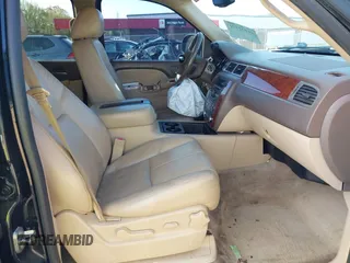 2014 Chevrolet Tahoe LT with VIN 1GNSCBE0XER202150, listed as a IAAI auction lot 41922771 with 168,693 mi miles and . Bid and sale history available at DreamBid. Image 5.