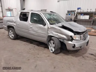 2014 Honda Ridgeline RTL with VIN 5FPYK1F57EB012362, listed as a IAAI auction lot 41078509 with 149,590 mi miles. Bid and sale history available at carsss.com. Image 1.