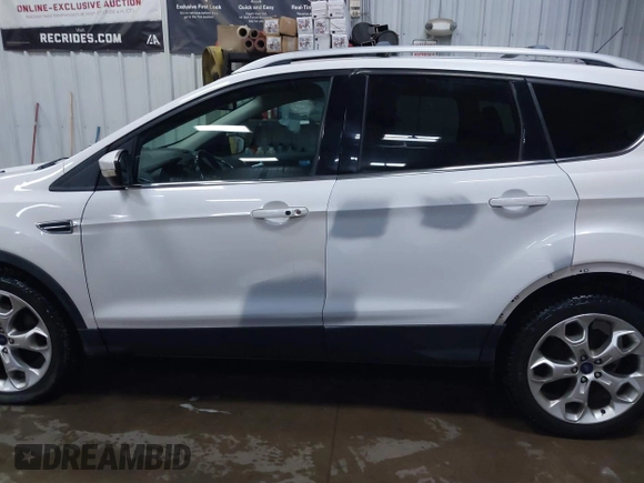 2013 Ford Escape Titanium с VIN 1FMCU9J96DUD54201, выставлен на аукционе IAAI как лот 42075287 с пробегом 147 923 миль миль и . История ставок и продаж доступна на DreamBid. Изображение 15.