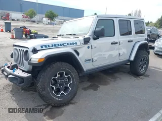 2023 Jeep Wrangler Rubicon with VIN 1C4JJXR69PW581474, listed as a IAAI auction lot 41697016 with 25,775 mi miles and . Bid and sale history available at DreamBid. Image 18.