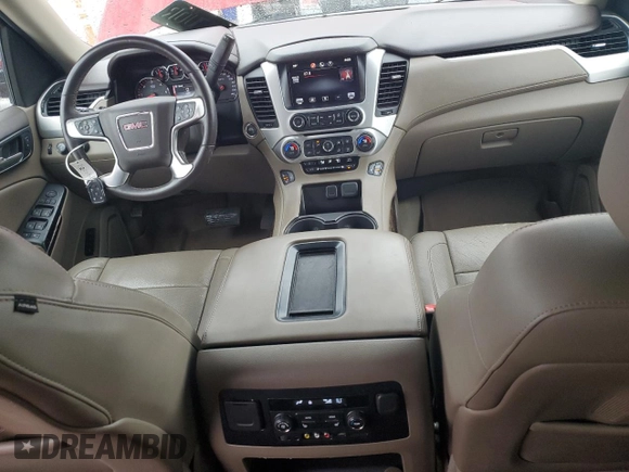2015 GMC Yukon SLT z VIN 1GKS2BKC6FR154565, wystawiony jako Copart lot #50881225 z przebiegiem 160 669 mil mil oraz Szkoda całkowita • Salvage title. Historia ofert i sprzedaży dostępna na DreamBid. Obrazek 8.