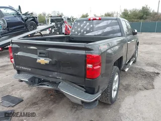 2015 Chevrolet Silverado 1500 LS with VIN 1GCVKPECXFZ436354, listed as a IAAI auction lot 41891065 with 128,164 mi miles. Bid and sale history available at carsss.com. Image 4.