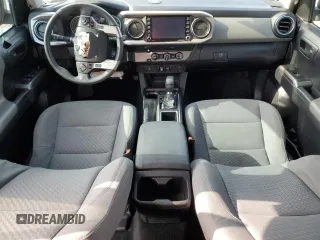 2020 Toyota Tacoma SR5 with VIN 5TFAZ5CNXLX095175, listed as a Copart auction lot 54339355 with 61,187 mi miles and Salvage title. Bid and sale history available at DreamBid. Image 8.