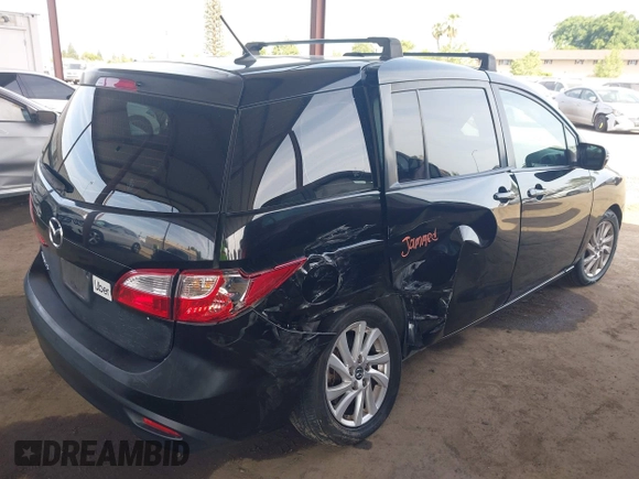 2015 Mazda 5 Sport with VIN JM1CW2BL2F0184901, listed as a IAAI auction lot 42116351 with 260,931 mi miles. Bid and sale history available at carsss.com. Image 4.