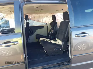 2016 Dodge Grand Caravan SE with VIN 2C4RDGBG4GR382970, listed as a IAAI auction lot 41215666 with 93,534 mi miles and . Bid and sale history available at DreamBid. Image 8.