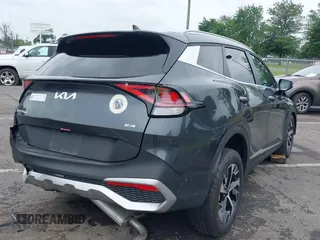 2023 Kia Sportage EX with VIN KNDPVCAG1P7110909, listed as a IAAI auction lot 42646436 with 16,304 mi miles and . Bid and sale history available at DreamBid. Image 4.