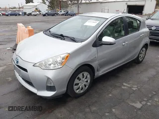 2014 Toyota Prius One with VIN JTDKDTB33E1067408, listed as a IAAI auction lot 41573895 with 245,383 mi miles and . Bid and sale history available at DreamBid. Image 2.