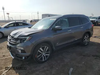 2017 Honda Pilot Touring with VIN 5FNYF6H95HB076897, listed as a Copart auction lot 58393445 with 134,874 mi miles and Salvage title. Bid and sale history available at DreamBid. Image 1.