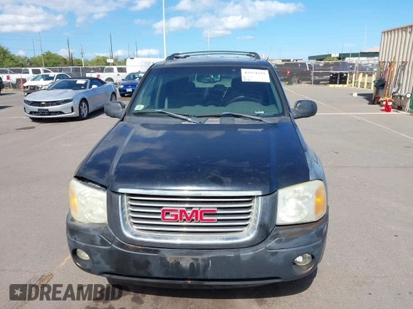 2002 GMC Envoy SLE z VIN 1GKDS13S922523317, wystawiony jako IAAI lot #42374259 z przebiegiem 185 686 mil mil oraz . Historia ofert i sprzedaży dostępna na DreamBid. Obrazek 6.