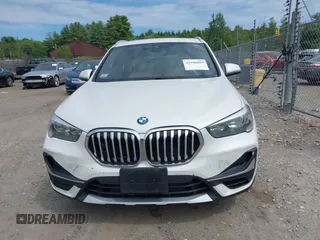 2021 BMW X1 xDrive28i with VIN WBXJG9C07M5U21337, listed as a IAAI auction lot 42590859 with 35,934 mi miles and . Bid and sale history available at DreamBid. Image 12.