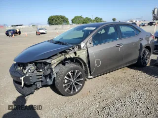2019 Toyota Corolla L z VIN 5YFBURHEXKP922866, wystawiony jako Copart lot #56989805 z przebiegiem 67 026 mil mil oraz Szkoda całkowita • Salvage title. Historia ofert i sprzedaży dostępna na DreamBid. Obrazek 1.