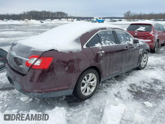 2011 Ford Taurus SEL with VIN 1FAHP2EW4BG115630, listed as a IAAI auction lot 41276945 with 166,867 mi miles. Bid and sale history available at carsss.com. Image 4.
