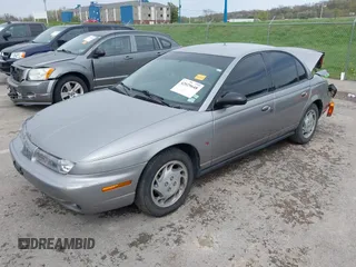 1997 Saturn SL with VIN 1G8ZK527XVZ257477, listed as a IAAI auction lot 42029648 with 114,371 mi miles and . Bid and sale history available at DreamBid. Image 17.