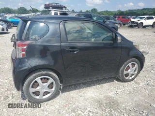 2014 Scion iQ with VIN JTNJJXB07EJ028558, listed as a Copart auction lot 64745345 with 112,221 mi miles and Clean title. Bid and sale history available at DreamBid. Image 3.