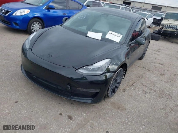 2021 Tesla Model 3 Performance with VIN 5YJ3E1EC0MF925439, listed as a IAAI auction lot 41363769 with 60,503 mi miles. Bid and sale history available at carsss.com. Image 2.