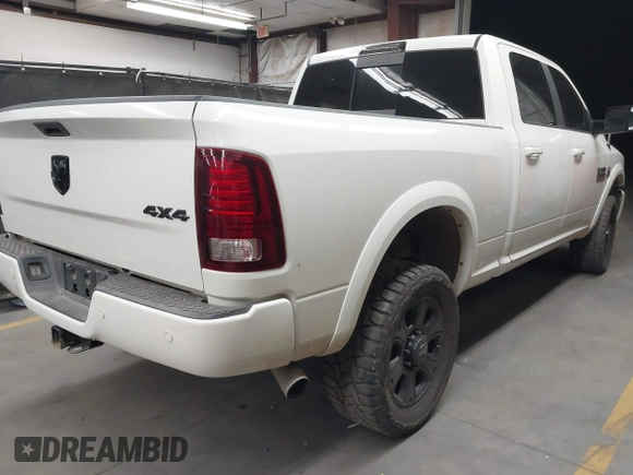 2017 Ram 2500 Laramie with VIN 3C6UR5FL1HG726325, listed as a IAAI auction lot 42315570 with 104,038 mi miles and . Bid and sale history available at DreamBid. Image 4.
