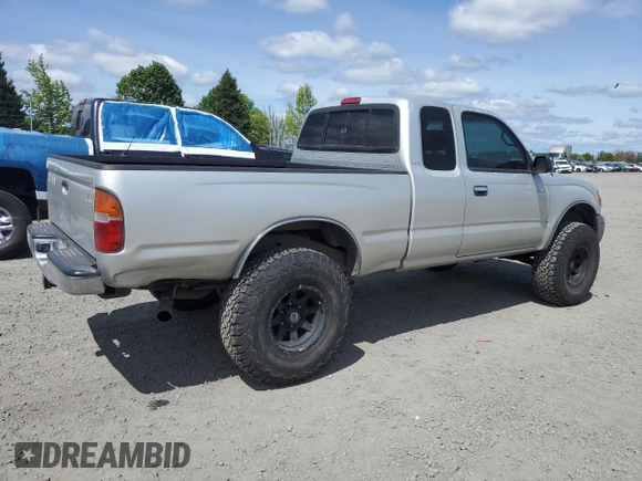 2000 Toyota Tacoma with VIN 5TEWN72N8YZ717707, listed as a Copart auction lot 54479455 with 197,407 mi miles and Salvage title. Bid and sale history available at DreamBid. Image 3.