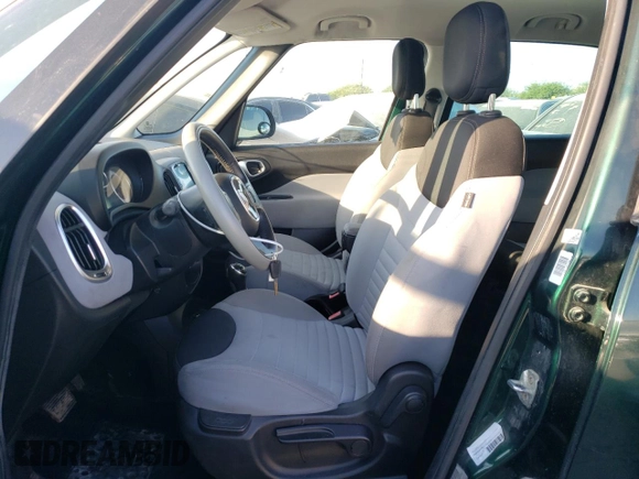 2014 FIAT 500L Easy with VIN ZFBCFABH1EZ023992, listed as a Copart auction lot 76139854 with 131,118 mi miles and Salvage Title. Bid and sale history available at carsss.com. Image 7.